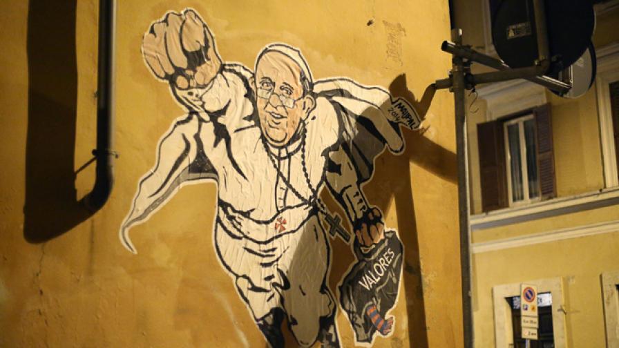 Ватиканът туитна графити на папата като супермен