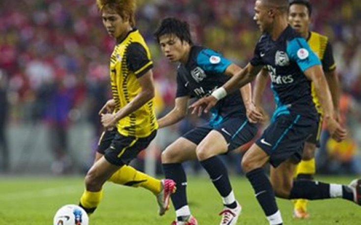 Аякс пожела японец от Арсенал