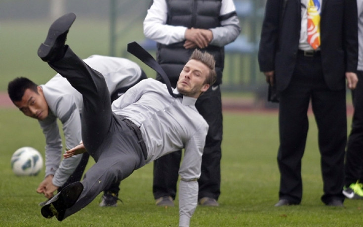 СНИМКИ: Дейвид Бекъм се изложи в Китай