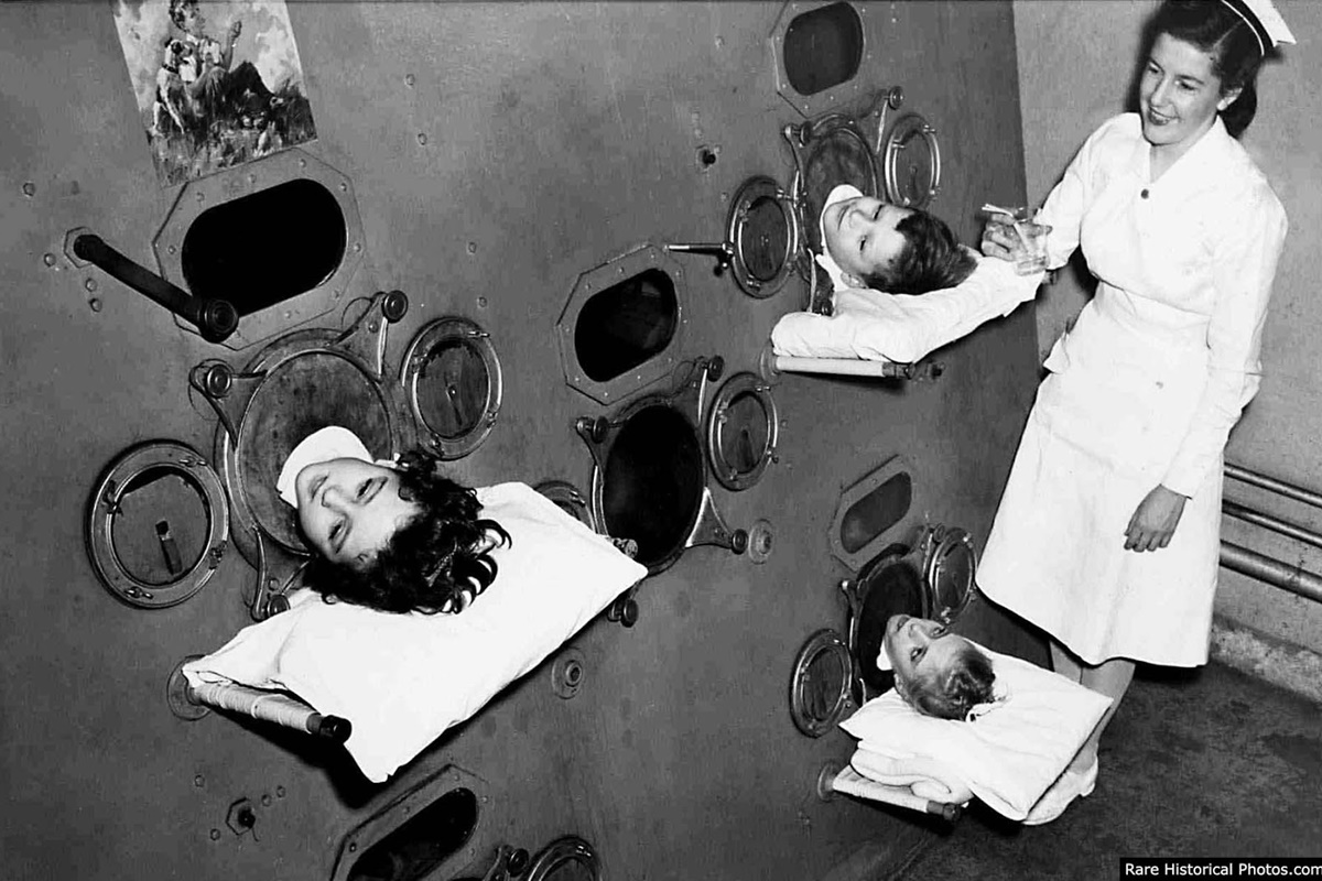 Въпреки че медицинската практика на снимката е съвсем адекватна и полезна, машината, от която се подават три детски глави, изглежда като от черно-бял холивудски филм на ужасите. Снимката е заснета през 1950 г. На нея се виждат три деца в комбиниран „железен бял дроб“. Тази технология се използва, за да позволи на пациента да диша, когато тялото му е загубило мускулната способност да извършва жизненоважната дейност.