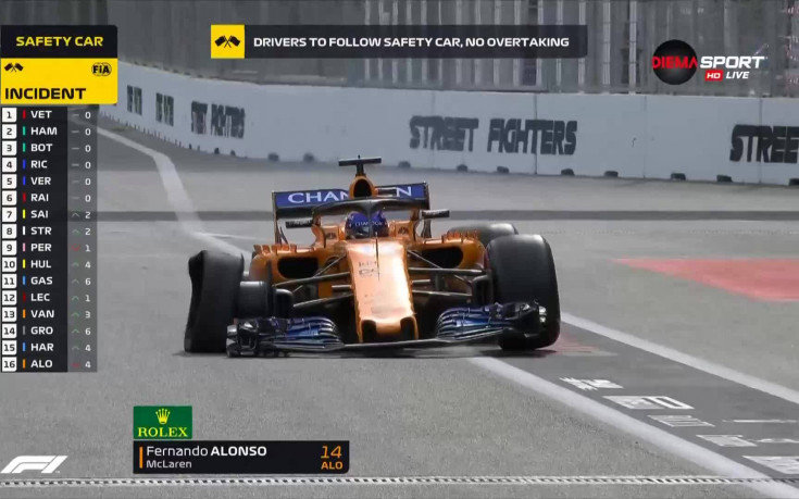 Класа и инат: Алонсо докара болида в бокса на две колела