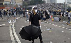  Чия е сянката зад проектозакона в Хонгконг 