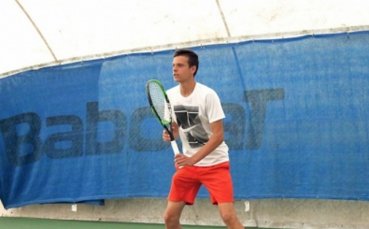 Българският тенисист Симеон Терзиев и партньорът му на двойки Александър
