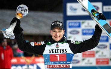 Анже Ланишек от Словения спечели състезанието по ски скокове от