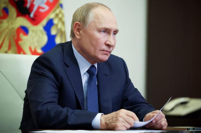 Путин