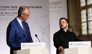 Германският канцлер Фридрих Мерц (вляво) и украинският президент Володимир Зеленски в Париж, 13 юли 2026 година