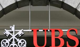 Ю Би Ес съкращава близо 9000 служители