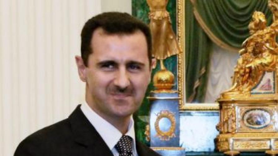 Асад към Давутоглу: Готови сме на война