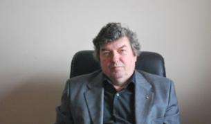 д-р Валери Кацунов e член на Комисията по досиетата и е редактор на сборника "Държавна сигурност и краят на тоталитаризма"